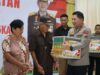 Hari Bhayangkara ke-79, Polda Sulut Salurkan 620 Paket Bansos kepada Warga Minsel