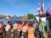Bhabinkamtibmas Desa Seloto Monitoring Kegiatan Jambore Pramuka Kwartir Cabang Taliwang di Lapangan Seloto