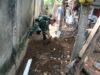 Antisipasi Banjir, Babinsa dan Warga Bersihkan Saluran Air